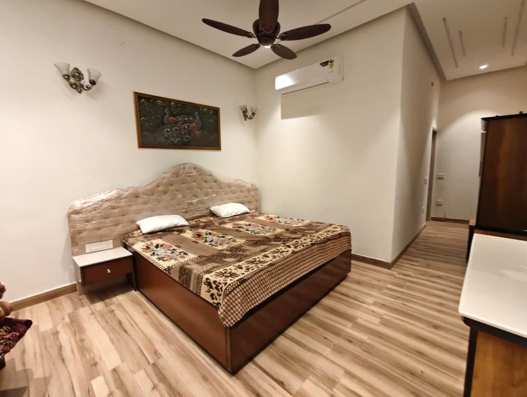 A wedding ceremony setup with a mountain backdrop.